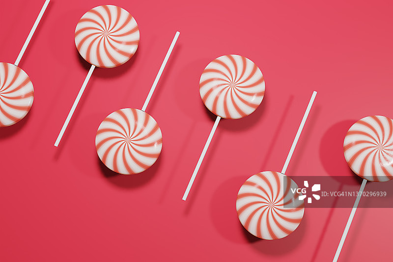 薄荷棒棒糖在红色背景为节日主题。三维渲染图片素材
