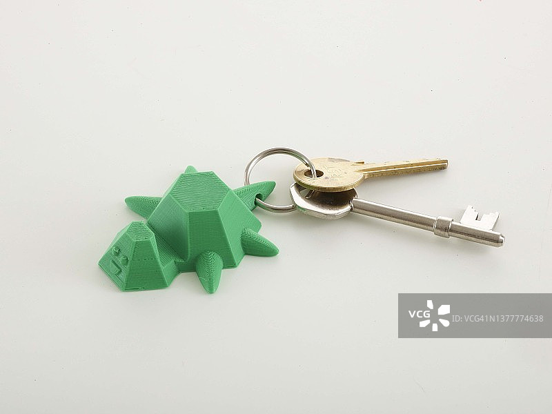 3D打印海龟电话架和钥匙圈与钥匙图片素材