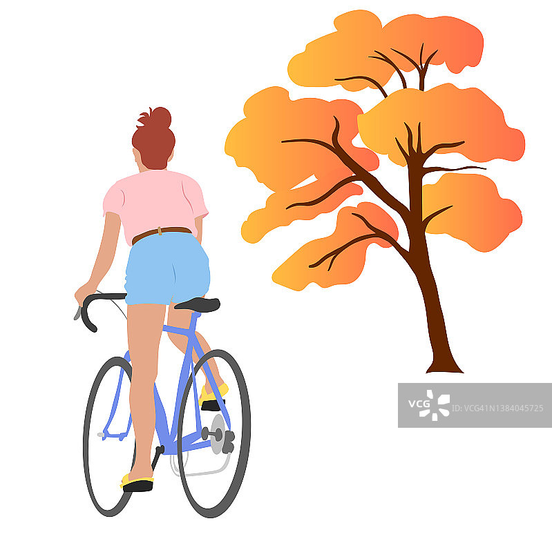秋天骑自行车的红发女孩图片素材