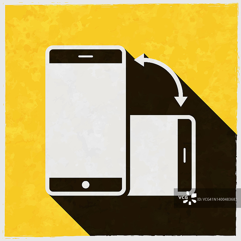 智能手机旋转。图标与长阴影的纹理黄色背景图片素材