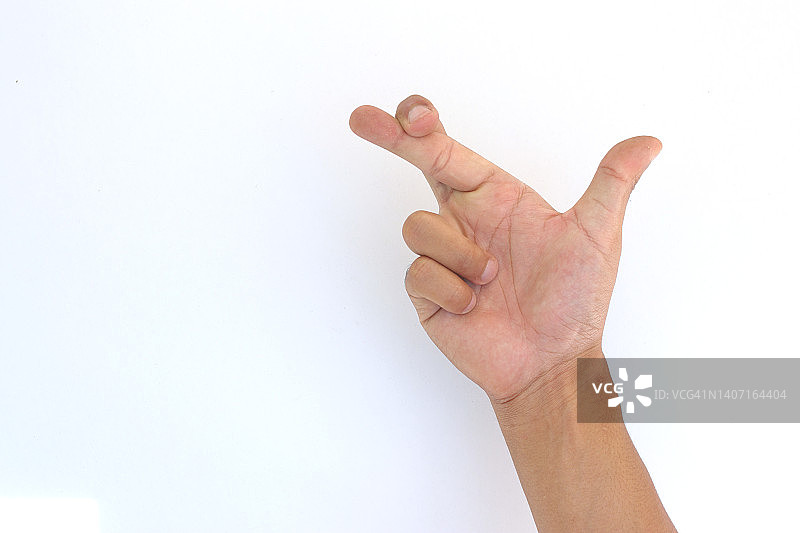 手指交叉标志孤立在白色背景图片素材