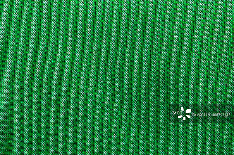 绿色运动服装面料，足球衫面料，运动衫纹理和织物背景。图片素材