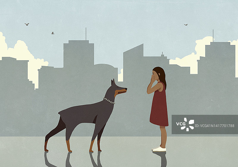害怕女孩和杜宾犬在城市人行道上面对面图片素材