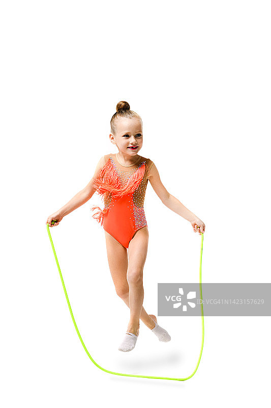 运动体操运动员漂亮的孩子跳绳图片素材