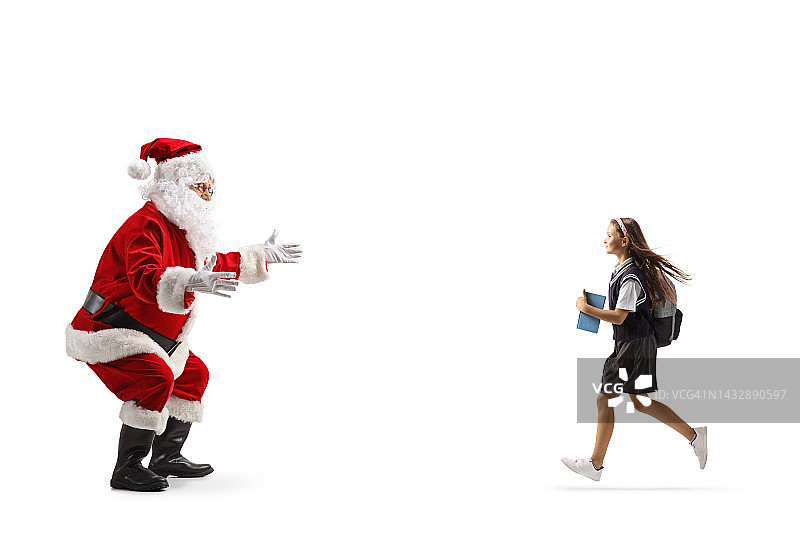 女生跑去拥抱圣诞老人图片素材