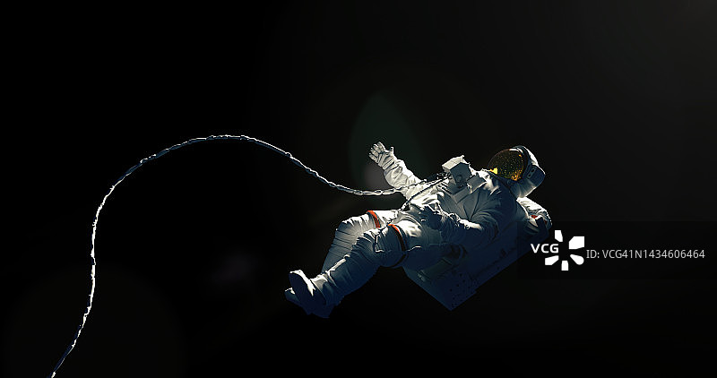 宇航员在黑色背景上漂浮在外太空。太空中的宇航员图片素材