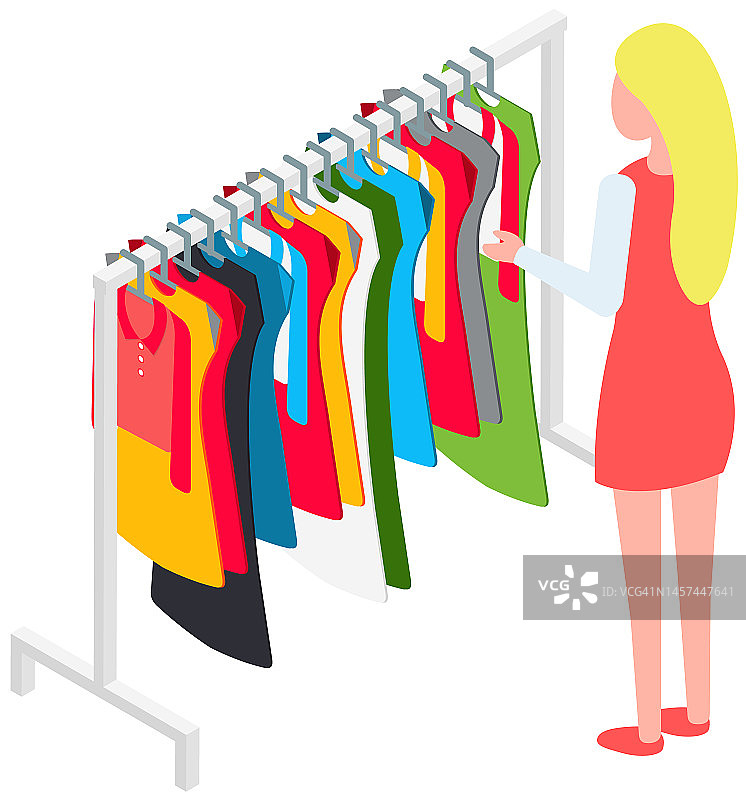 在店里挑选衣服，购物理念。女买家在试衣间挑选衣服图片素材