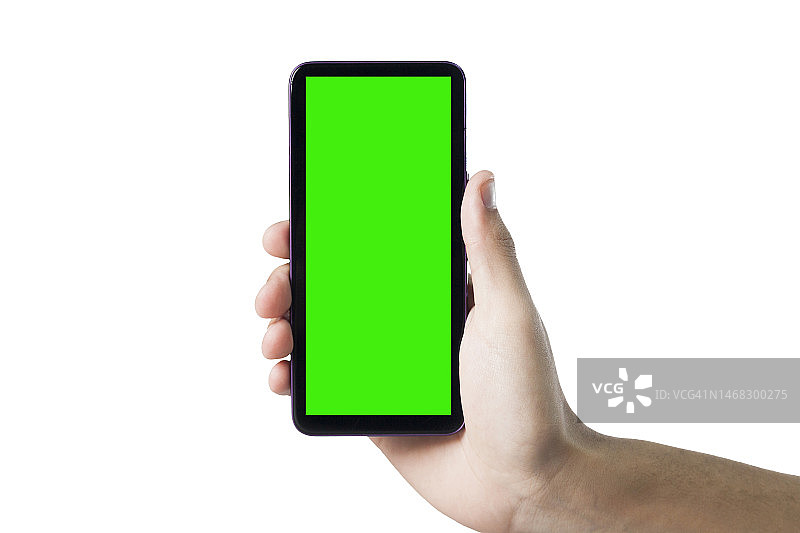 手持智能手机，绿色屏幕。图片素材
