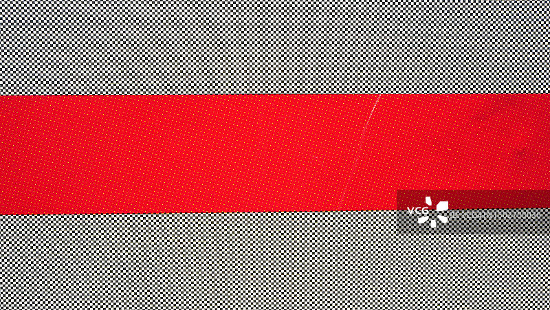 一张灰色和红色海报的微距照片，贴在墙上，用胶印技术印刷，法国巴黎图片素材