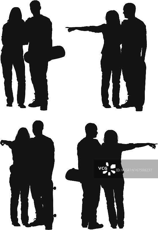 一对夫妇用滑板的剪影图片素材