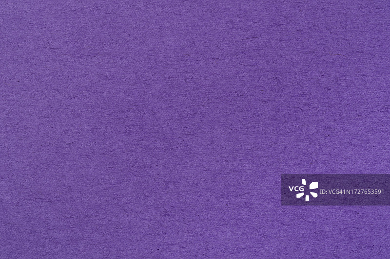 紫色纸片纹理纸板背景。图片素材