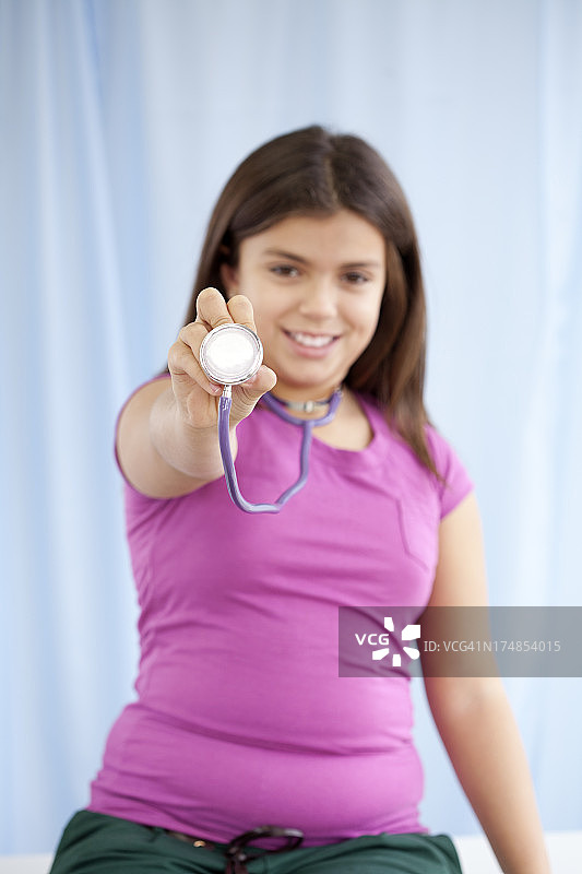 女孩梦想成为一名医生图片素材