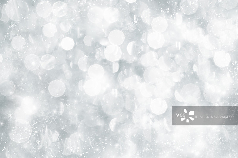 抽象的银色圣诞背景与白色的雪花图片素材