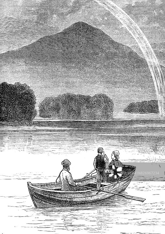 一个男人在湖上划船，女人和一个男孩作为客人图片素材