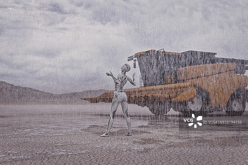 机器人在沙漠中仰望雨水图片素材