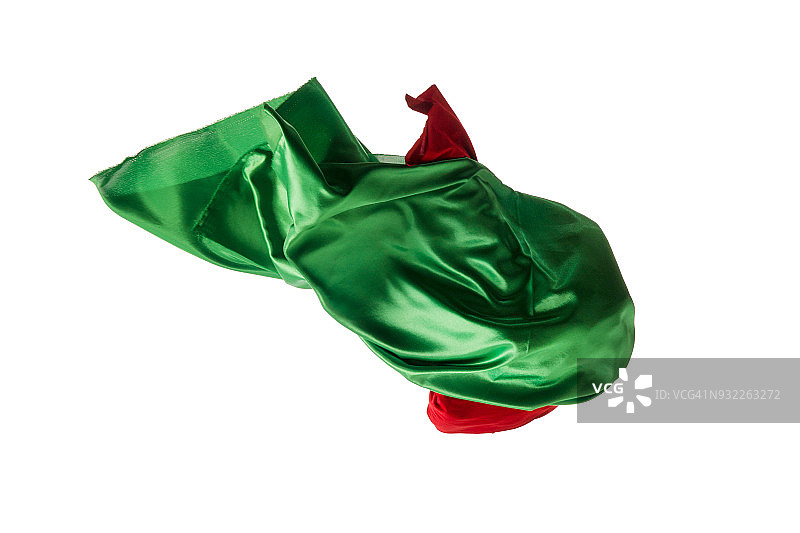 光滑优雅的透明红，绿色的布分开在白色的背景图片素材