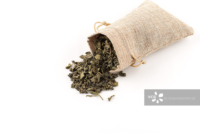 火药绿茶在麻袋特写照片为背景图片素材