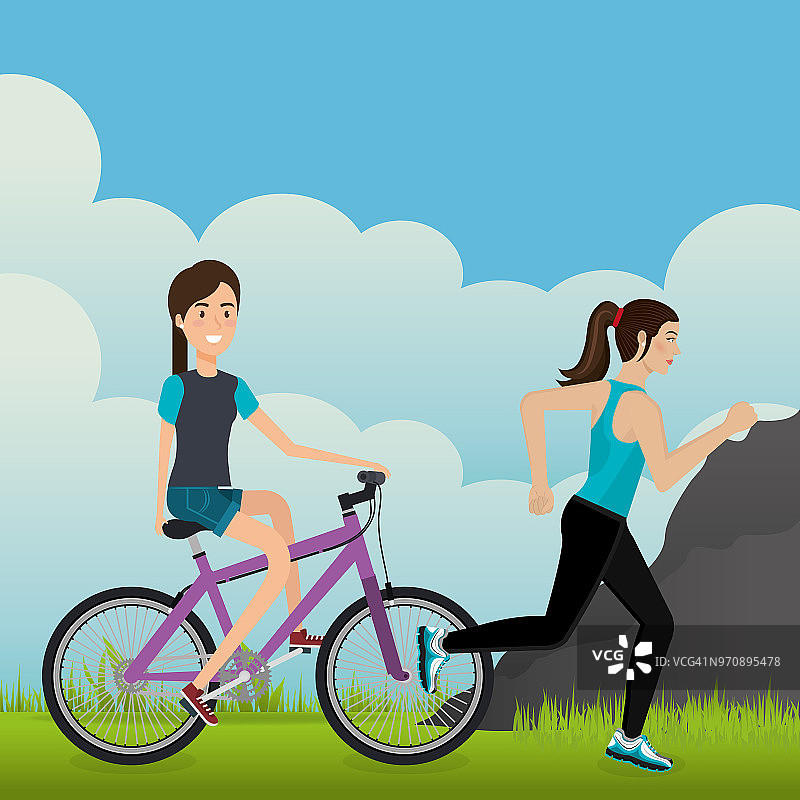 在风景中骑着自行车的女人图片素材