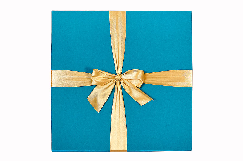 优雅的蓝色硬纸板礼盒与一个金色的蝴蝶结图片素材