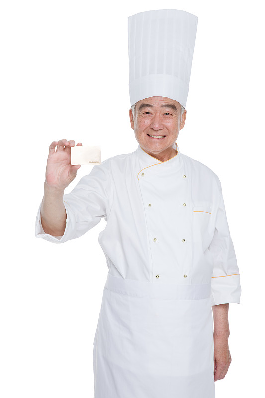 穿着厨师服老年男人拿着卡片图片素材
