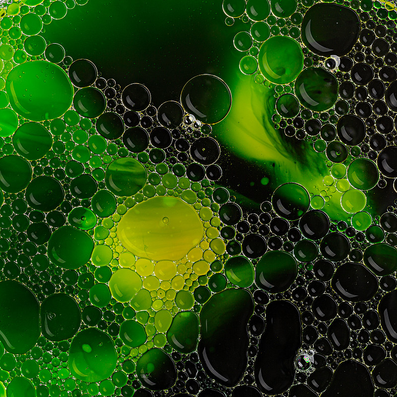 绿色和黄色的抽象背景与气泡图片下载