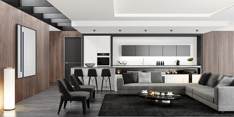 豪华现代室内客厅与现代极简主义意大利风格开放式空间厨房与大长厨房岛。图片素材