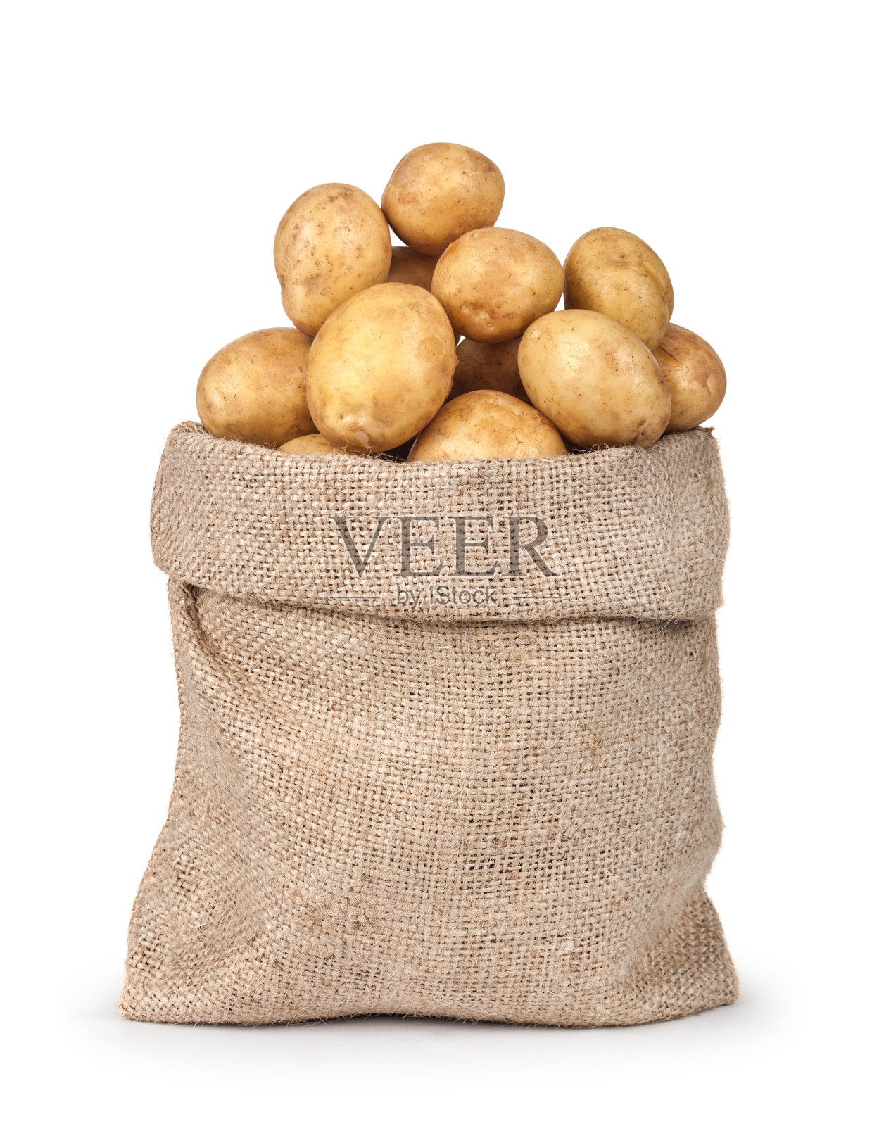 袋子里的土豆孤立在白色的背景上。特写镜头照片摄影图片