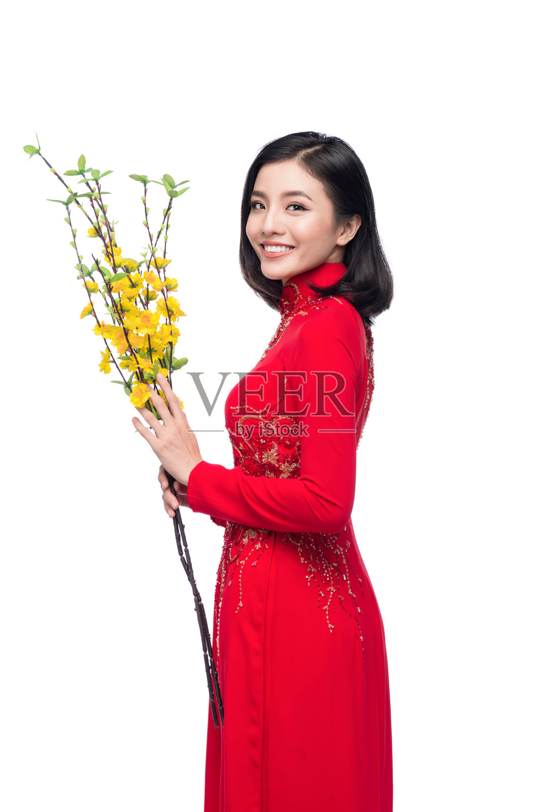 一个美丽的亚洲女人的肖像上的传统节日服装照片摄影图片