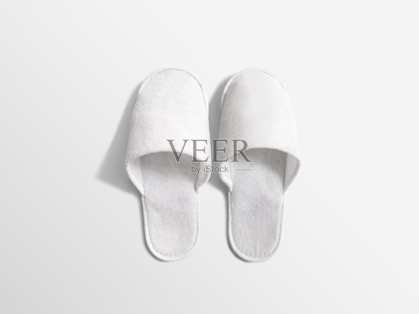 一双空白软白色家用拖鞋，设计样板照片摄影图片