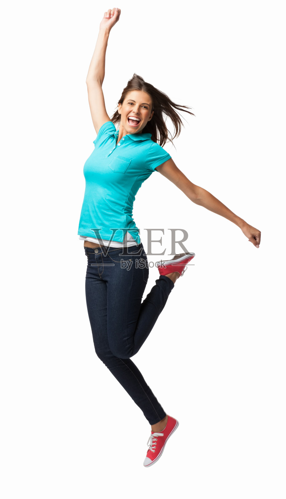 欣喜若狂的年轻女子跳跃-孤立照片摄影图片