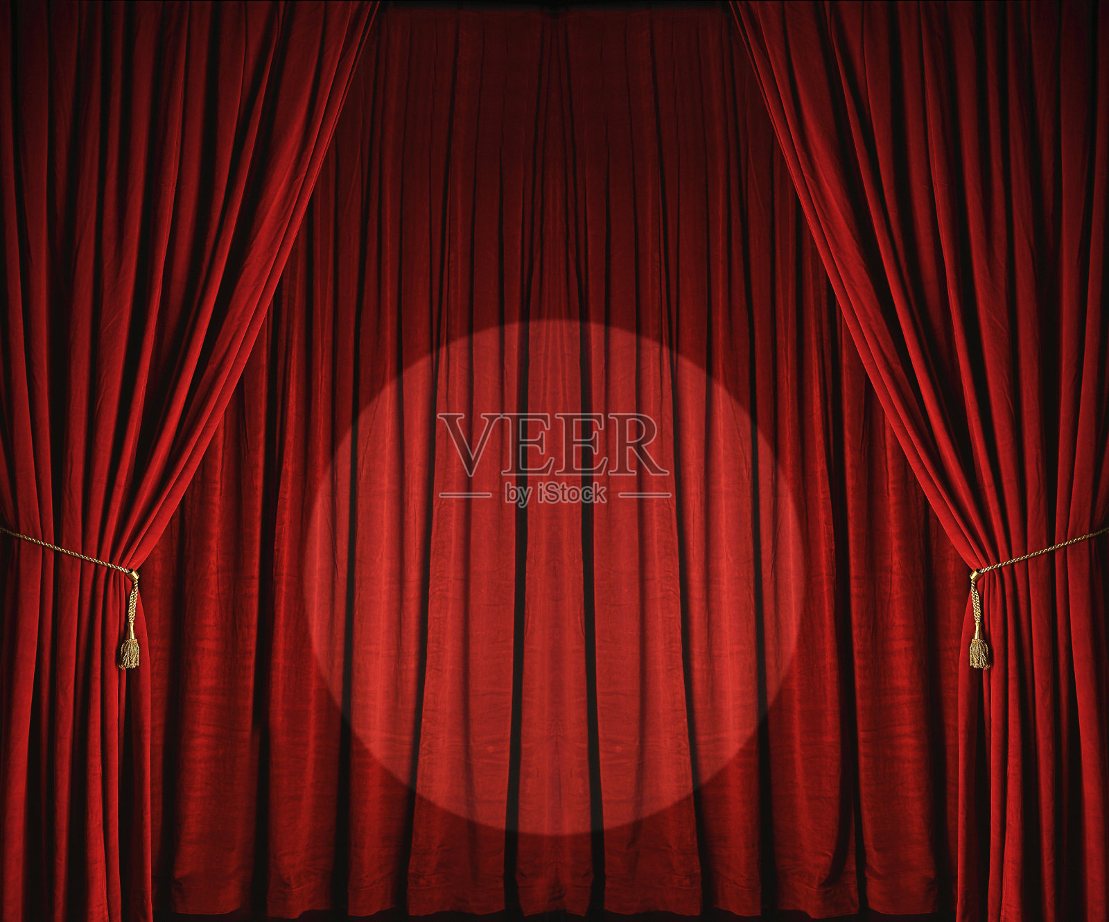 带有聚光灯的大红色剧院窗帘照片摄影图片