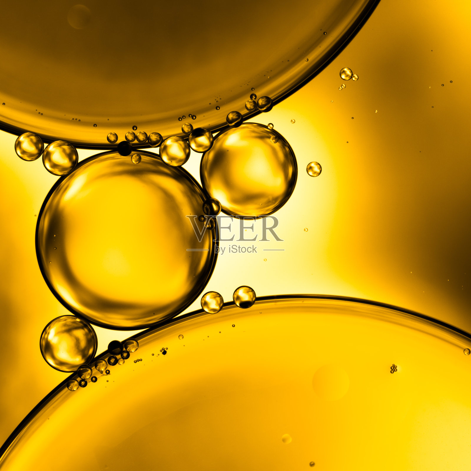 油和水-抽象的黄色金棕色宏观背景照片摄影图片