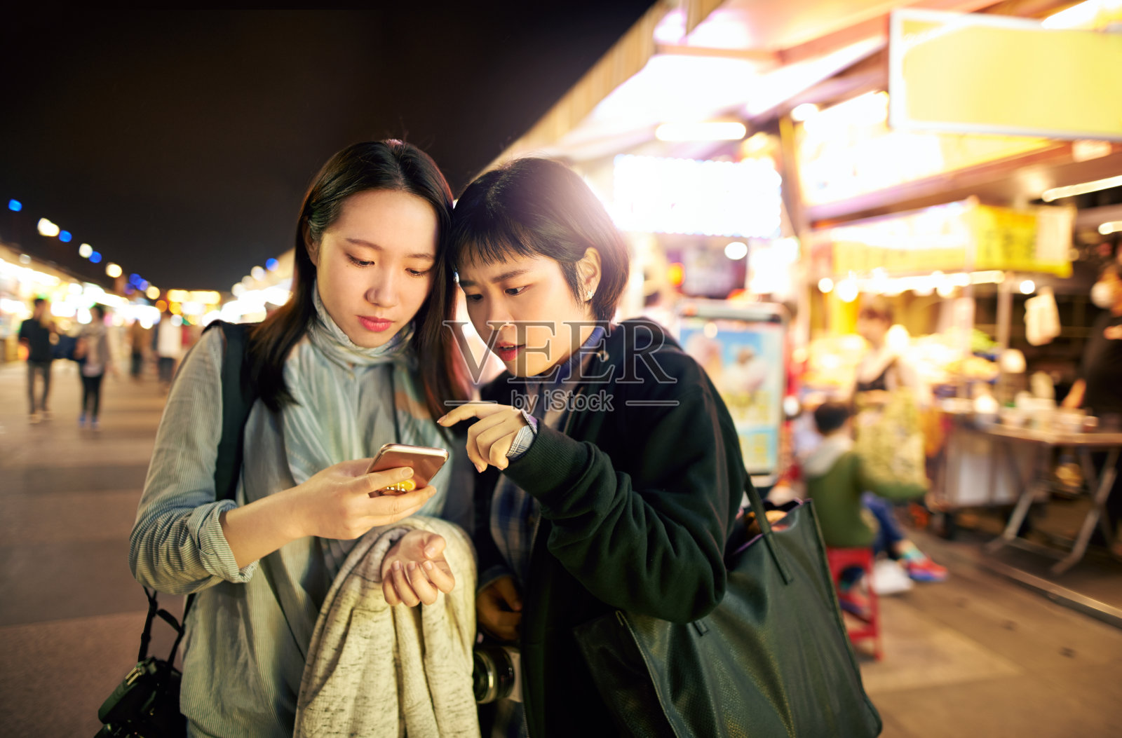 体验app时代的街头市场照片摄影图片