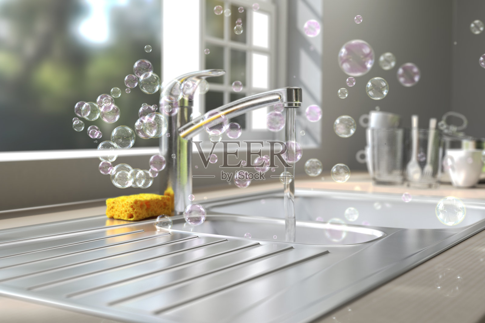 洗盘子时，肥皂泡泡在厨房的水槽里漂浮照片摄影图片