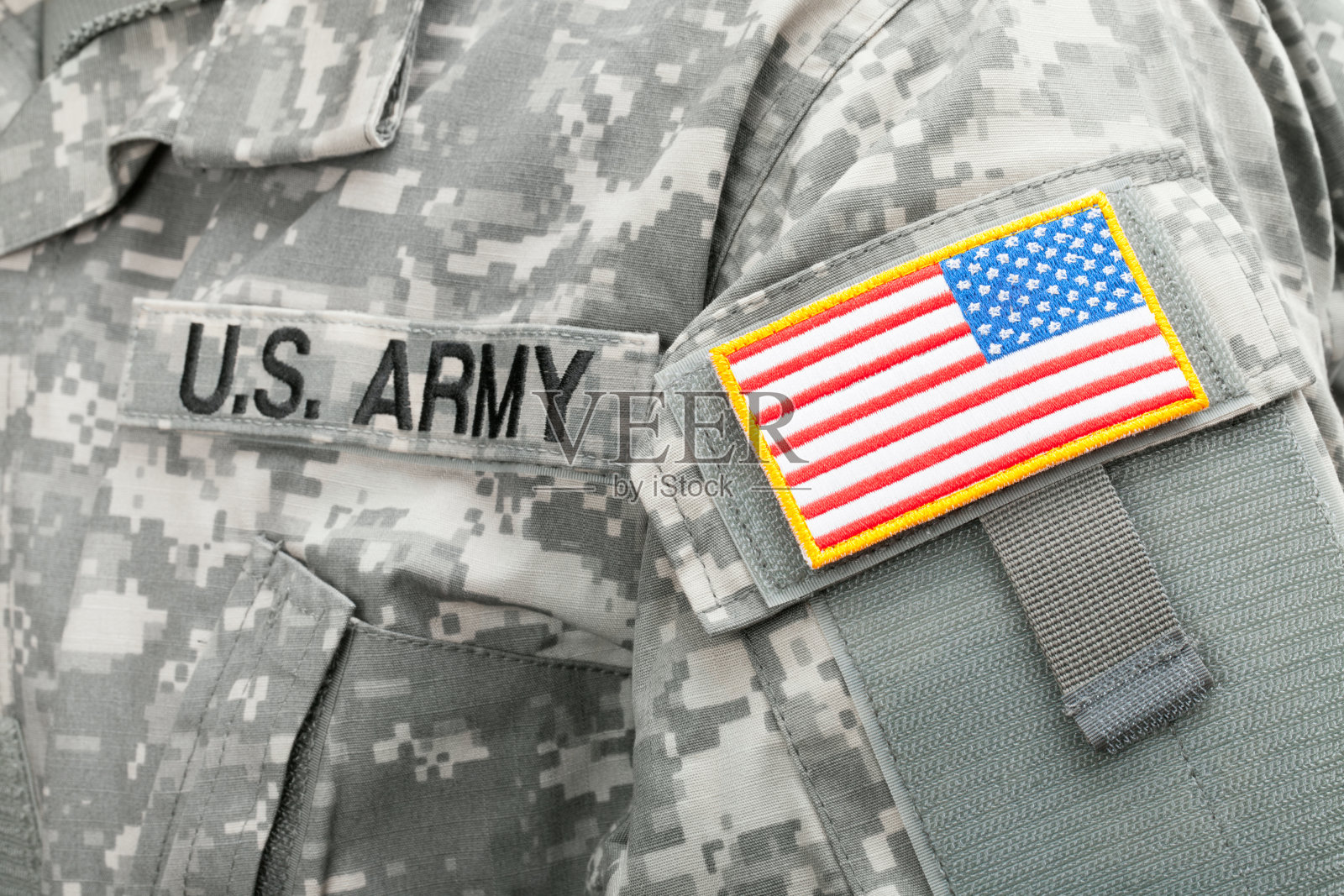 近距离拍摄的美国国旗和美国陆军补丁的士兵制服照片摄影图片