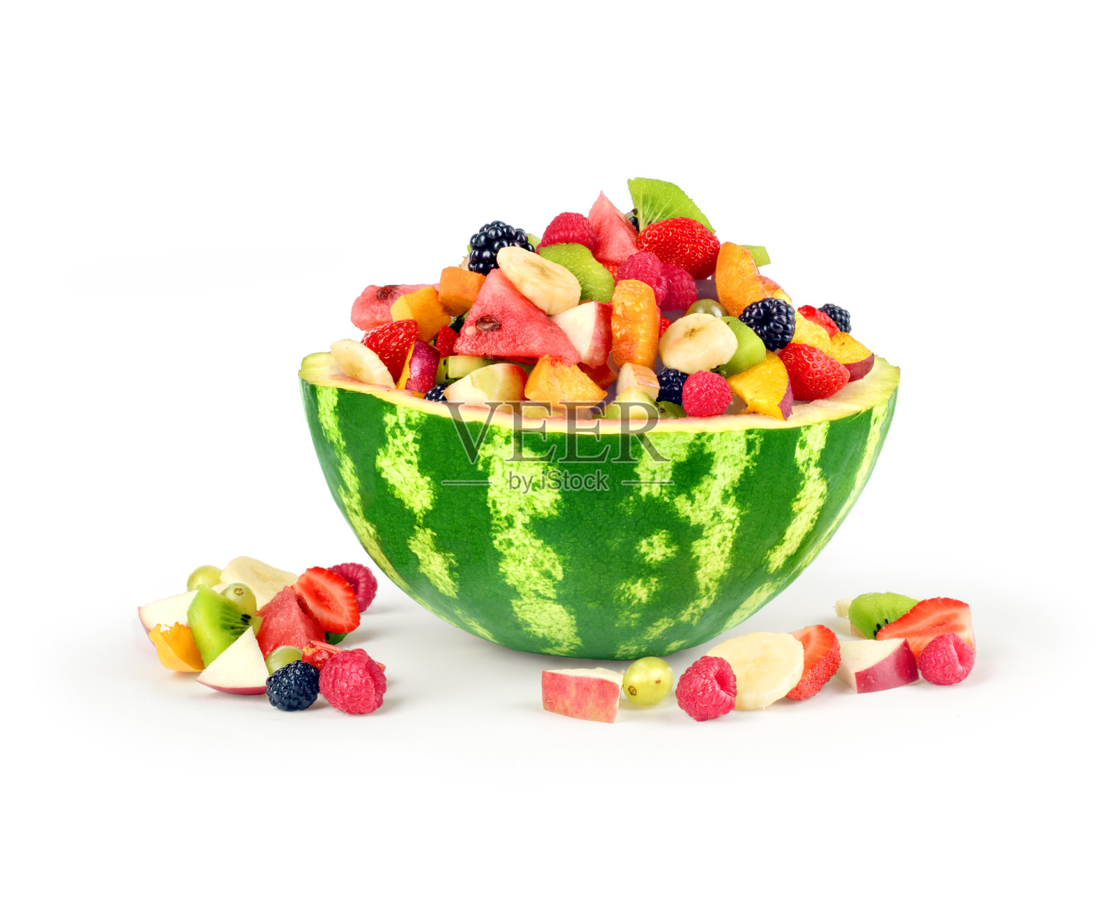 西瓜和其他水果在白色的背景照片摄影图片