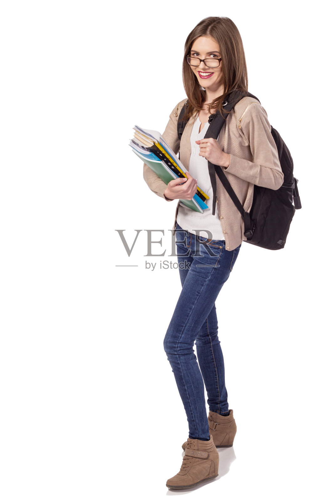 年轻快乐的学生带着笔记本和背包照片摄影图片