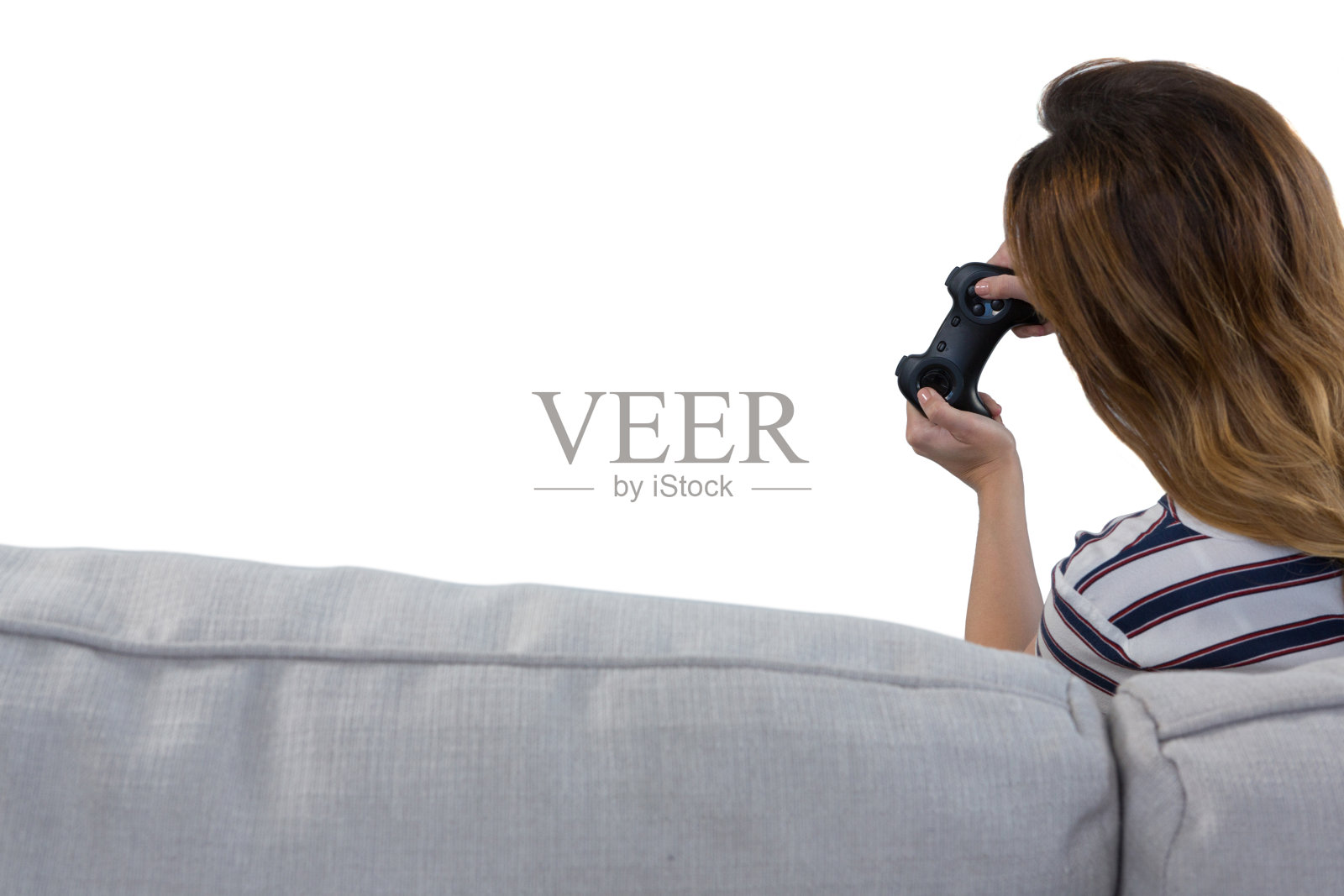 在白色背景下玩电子游戏的女人照片摄影图片