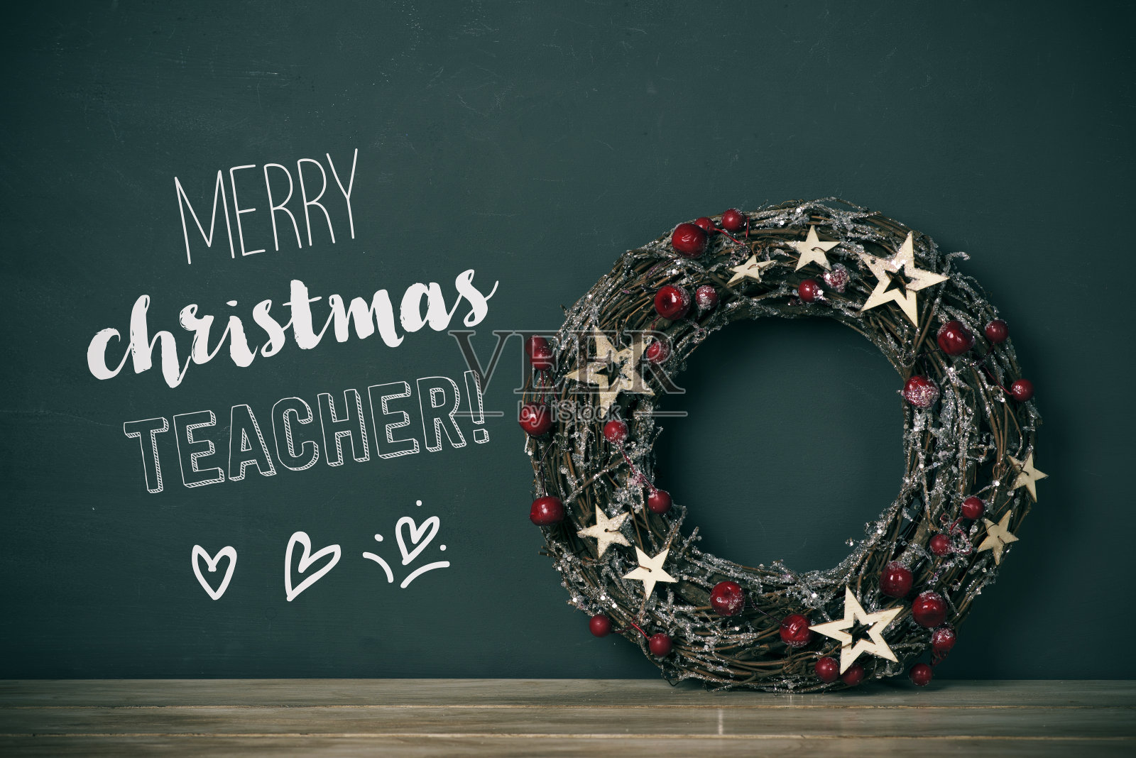 花环和短信祝老师圣诞快乐照片摄影图片