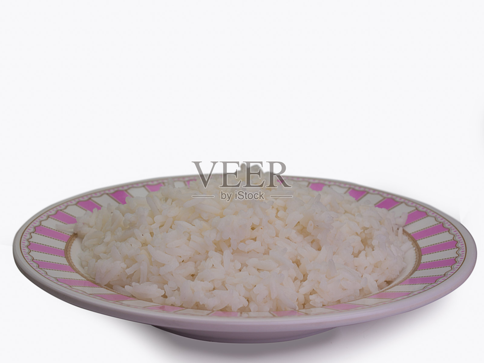 碗里装满了白米饭。照片摄影图片