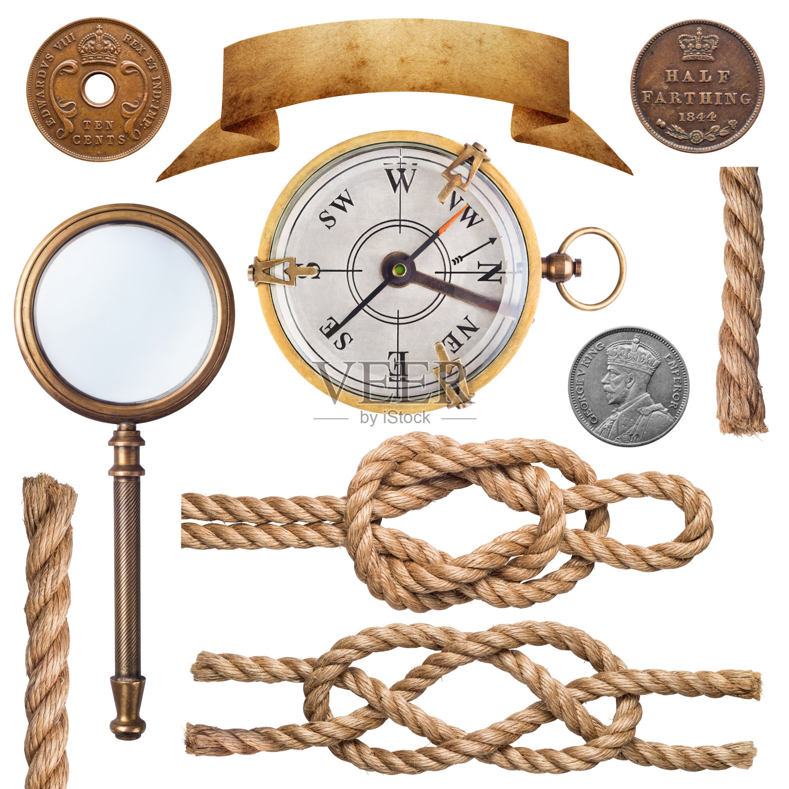 一套航海绳结，旧硬币，放大镜和指南针孤立在白色背景上。照片摄影图片