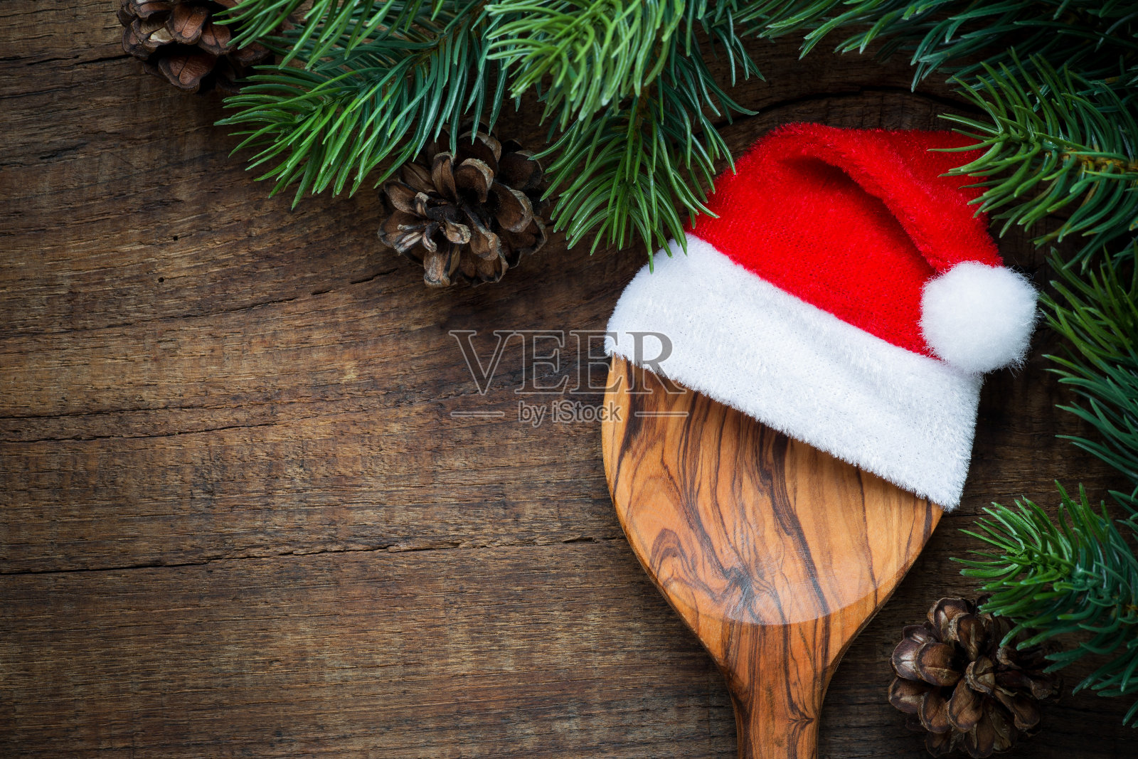 勺子和圣诞老人的帽子照片摄影图片