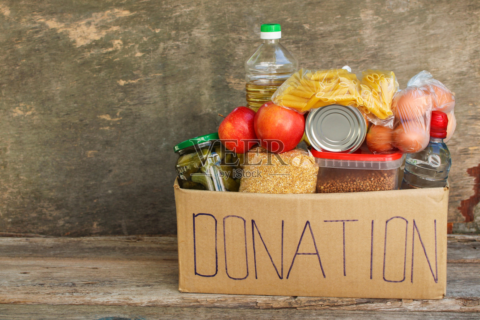 装食物的捐款箱。照片摄影图片