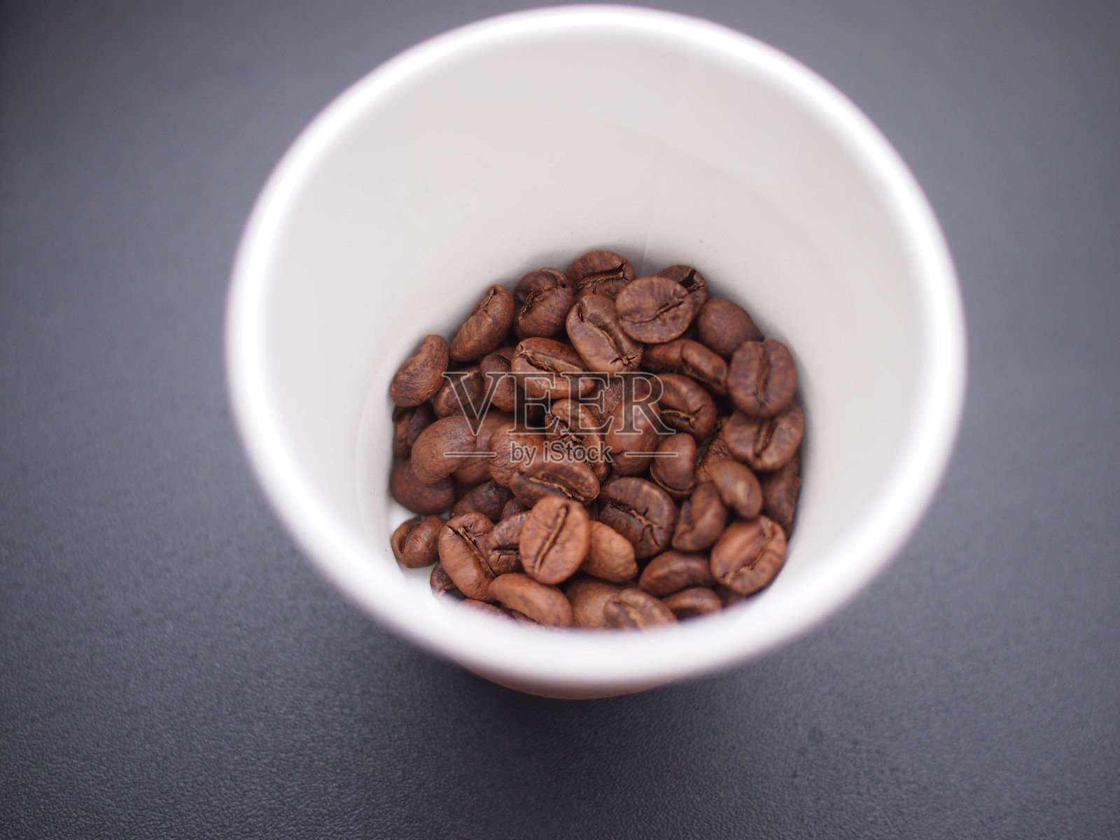 杯子里的咖啡豆照片摄影图片