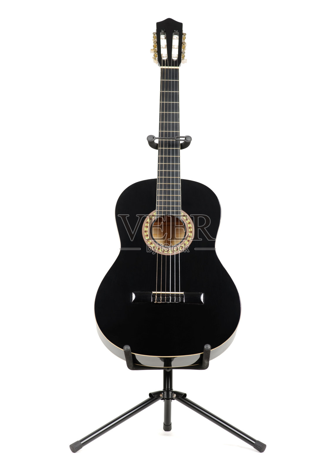 黑色古典吉他与吉他架上孤立的白色背景。照片摄影图片
