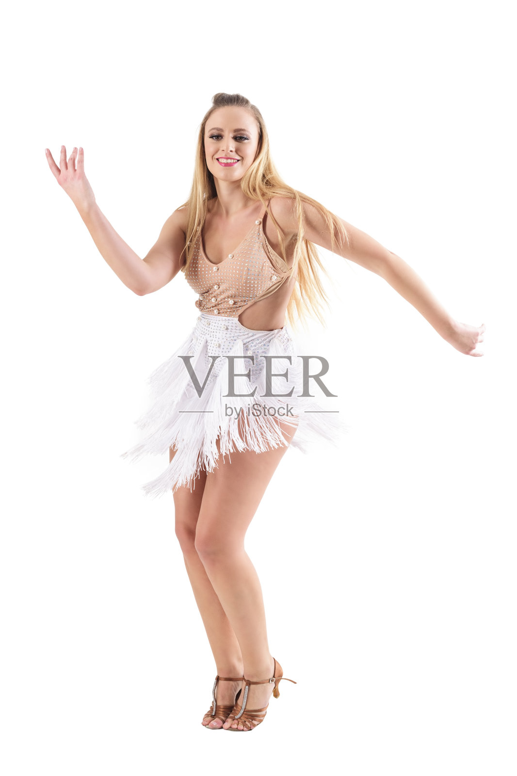 微笑快乐的职业白人妇女跳舞拉丁美洲舞。照片摄影图片