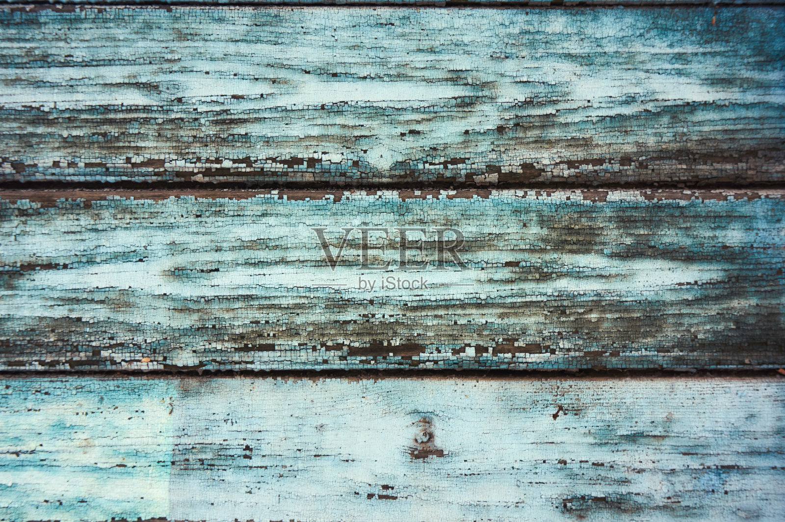 旧木底色为蓝色油漆。照片摄影图片