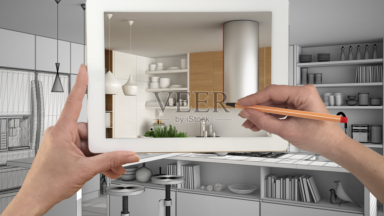 手握着并在平板上绘制显示真正完成的极简主义白色和木制厨房。现代厨房效果图为背景，建筑室内设计呈现照片摄影图片