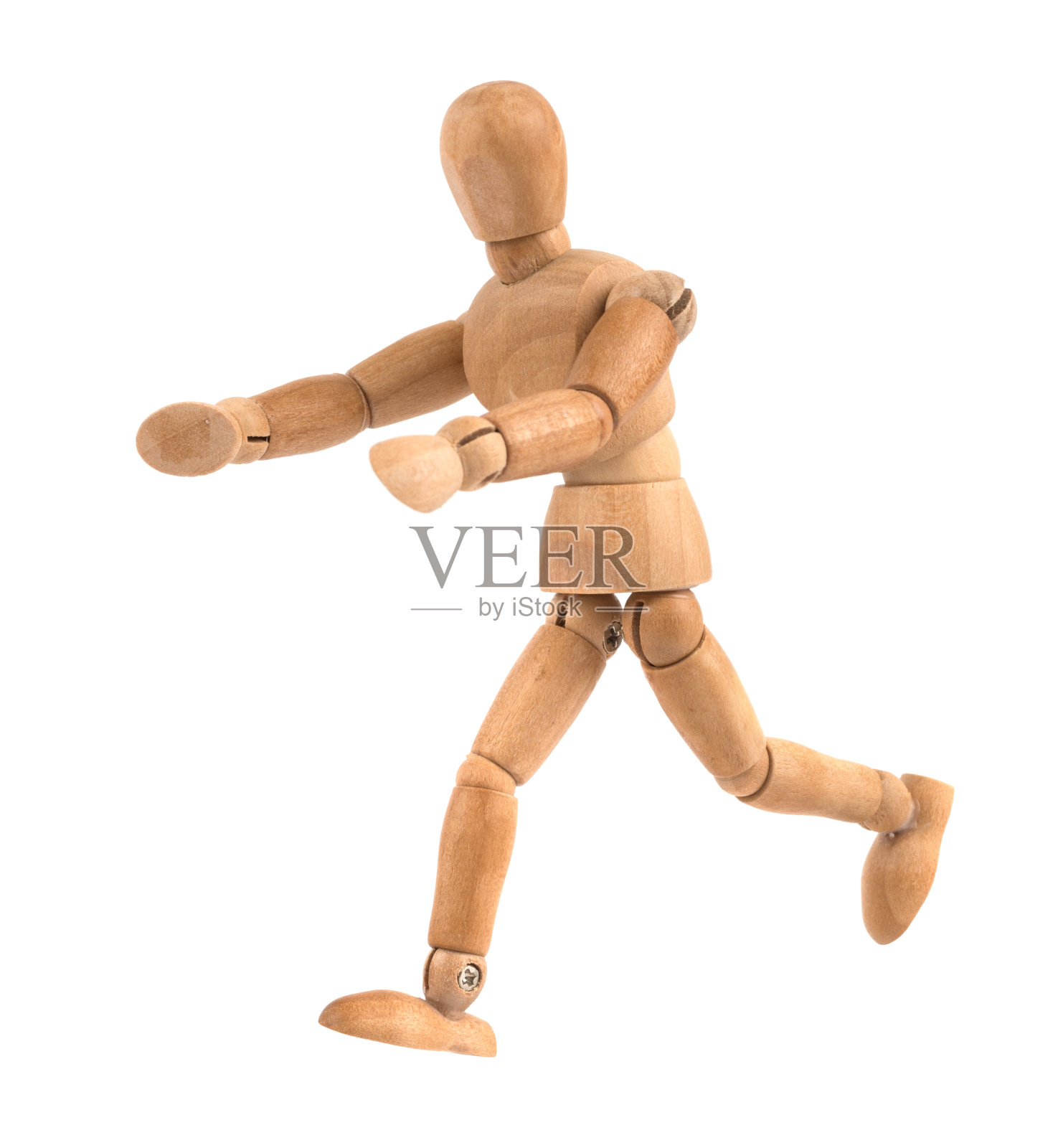 奔跑的木制人体模型，双手向前照片摄影图片
