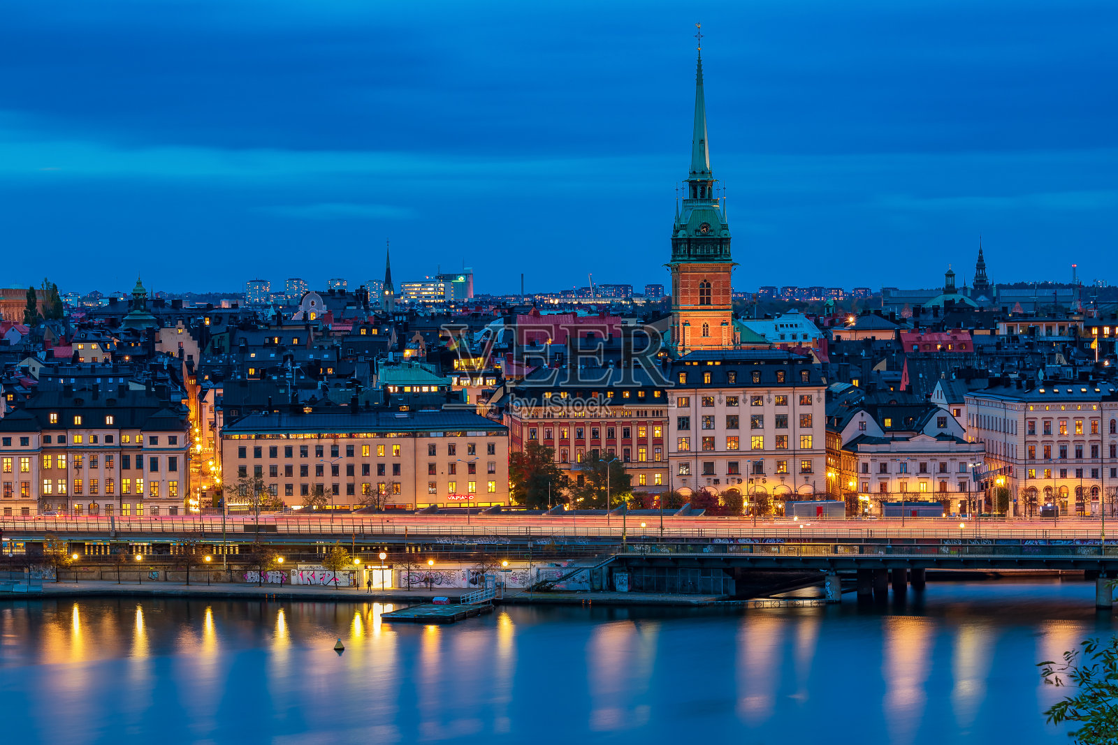 斯德哥尔摩老城格拉斯坦和瑞典的德国教堂的日落景观照片摄影图片